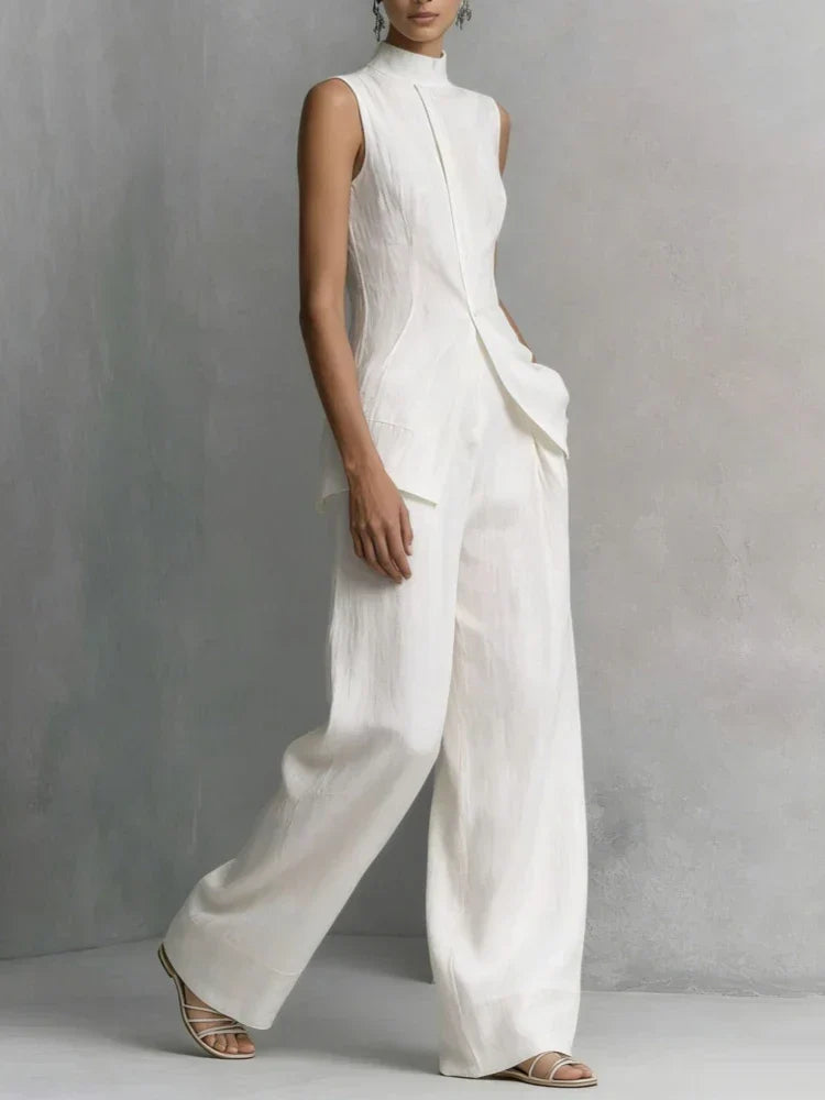 Sophisticated women's sleeveless high neck wide leg jumpsuit, offering chic comfort for any elegant occasion.