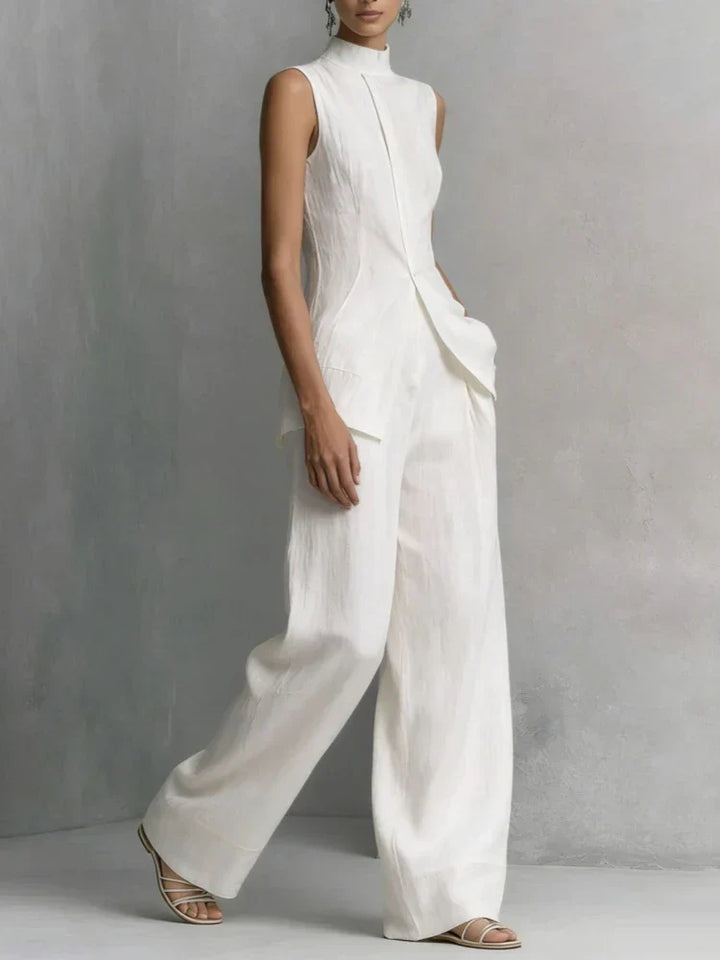Sophisticated women's sleeveless high neck wide leg jumpsuit, offering chic comfort for any elegant occasion.