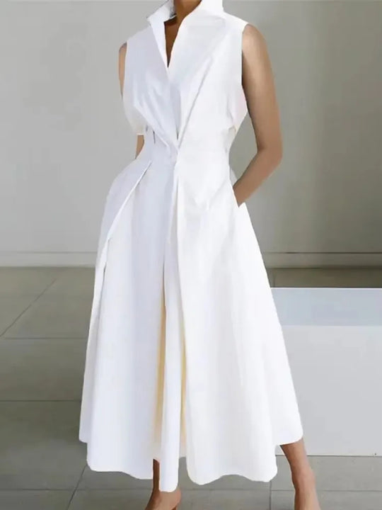 Stylish sleeveless midi dress for women, featuring a chic lapel, A-line cut, and convenient side pockets.