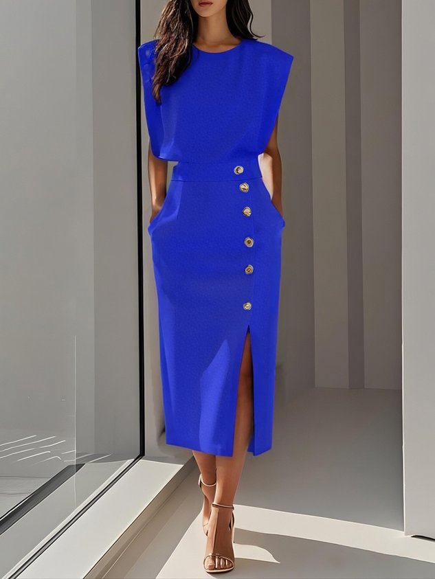 Tailored elegant midi dress for women, sleeveless, showing a graceful slit & gold buttons.