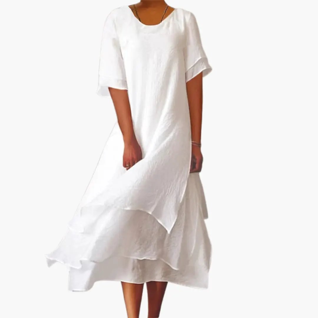 Elegant women's sleeveless midi dress with a round neck. Perfect for summer, sophisticated casual wear, and versatile styling.