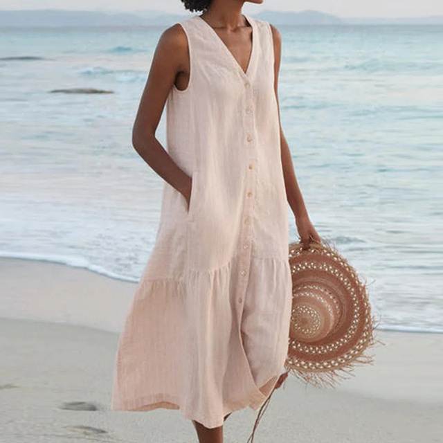 Elegant women's sleeveless midi dress with button front, V-neck, and flowy tiered skirt, perfect for summer.