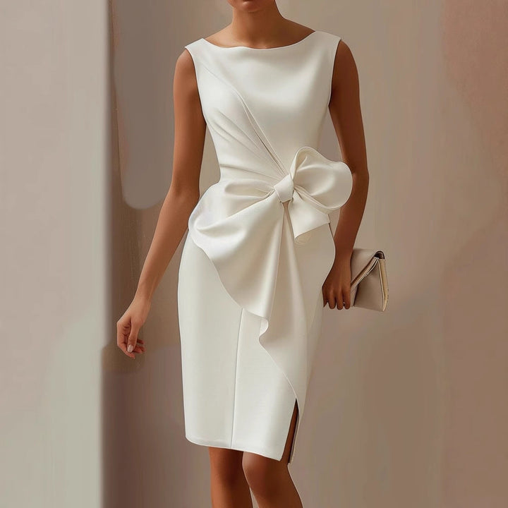 Stylish fitted sleeveless mini dress with a flattering waist tie, ideal for parties, summer evenings, or special occasions.