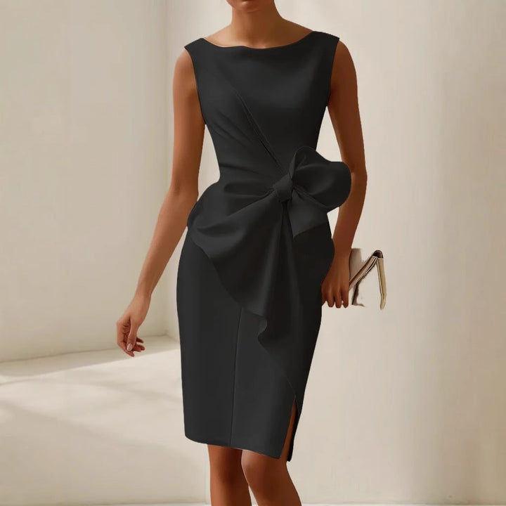 Flattering fitted women's sleeveless mini dress with an elegant waist tie, great for cocktail parties & sophisticated evenings.