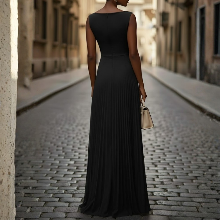 Ladies' elegant sleeveless pleated maxi dress. Formal boat neck evening gown, perfect for special occasions.
