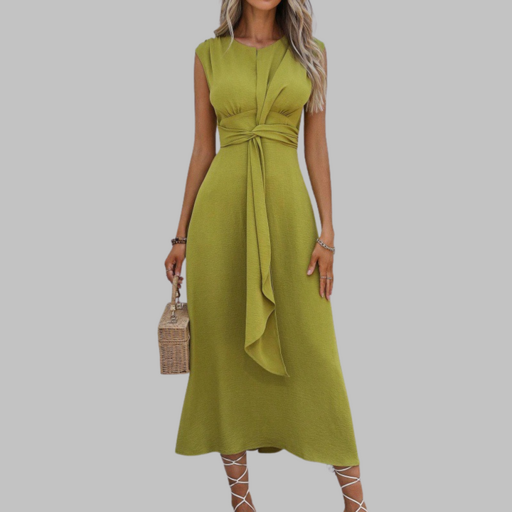 Beautiful green sleeveless maxi dress for women, featuring an elegant round neck, ideal for casual or evening events.
