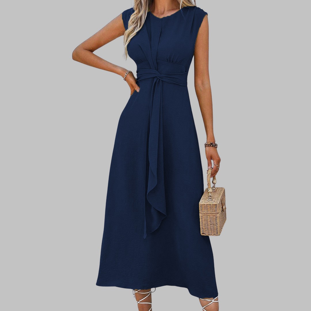 Women's summer fashion green maxi dress, elegant sleeveless design with a round neck, comfortable and chic for day or night.