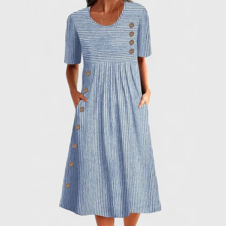 Elegant women's sleeveless striped midi dress with functional button detail, perfect for versatile summer or spring fashion.