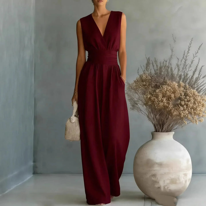 Stylish women's V-neck sleeveless wide-leg jumpsuit with high waist, ideal for elegant and casual chic summer outfits.