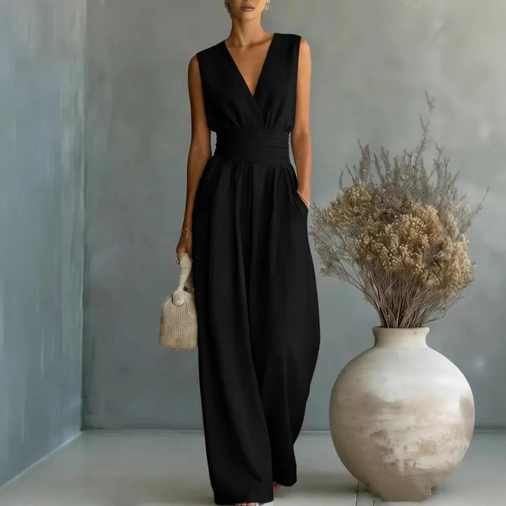Chic women's wide-leg jumpsuit, featuring a sleeveless V-neck design, perfect for sophisticated summer fashion.