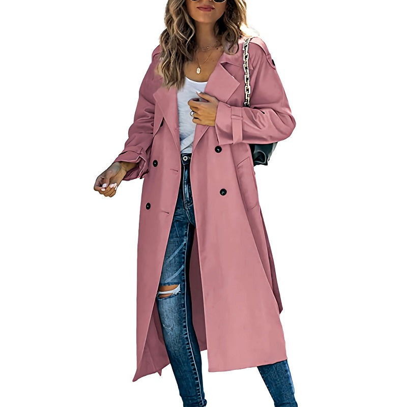 Close-up of a women's belted trench coat, highlighting the classic collar and slim-fit silhouette.