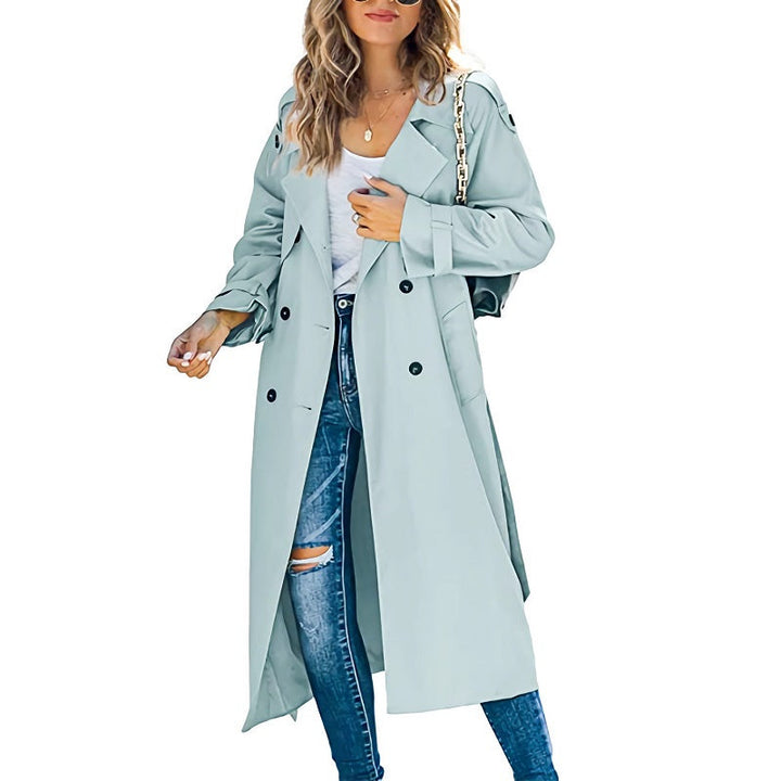 Back view of an elegant women's trench coat, featuring a cinched belted waist for a flattering slim fit.
