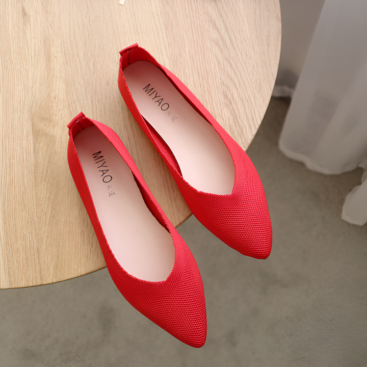 Stylish women's slip-on ballerina flats with a comfortable round toe for daily wear.
