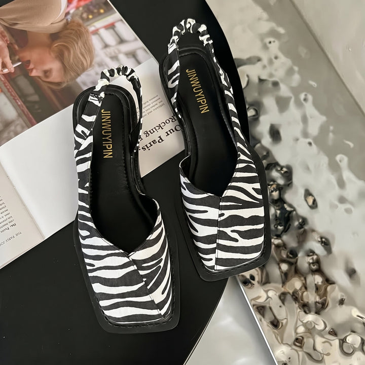 Versatile women's square toe slingback sandals with a sturdy block heel, great for both casual & elegant summer looks.