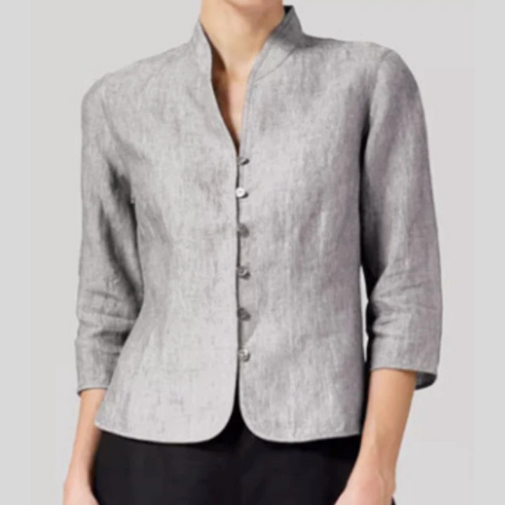 Elegant women's stand collar blouse with polished three-quarter sleeves, perfect for office or smart casual wear.