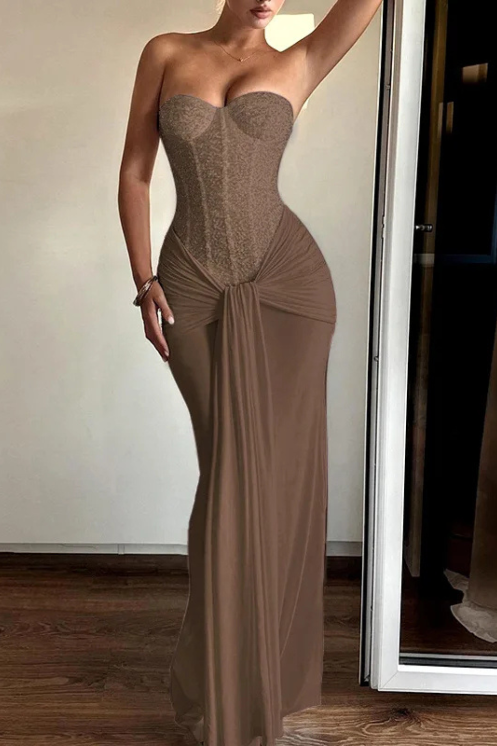 Women's elegant strapless mermaid maxi dress with sweetheart neckline and fitted corset bodice.