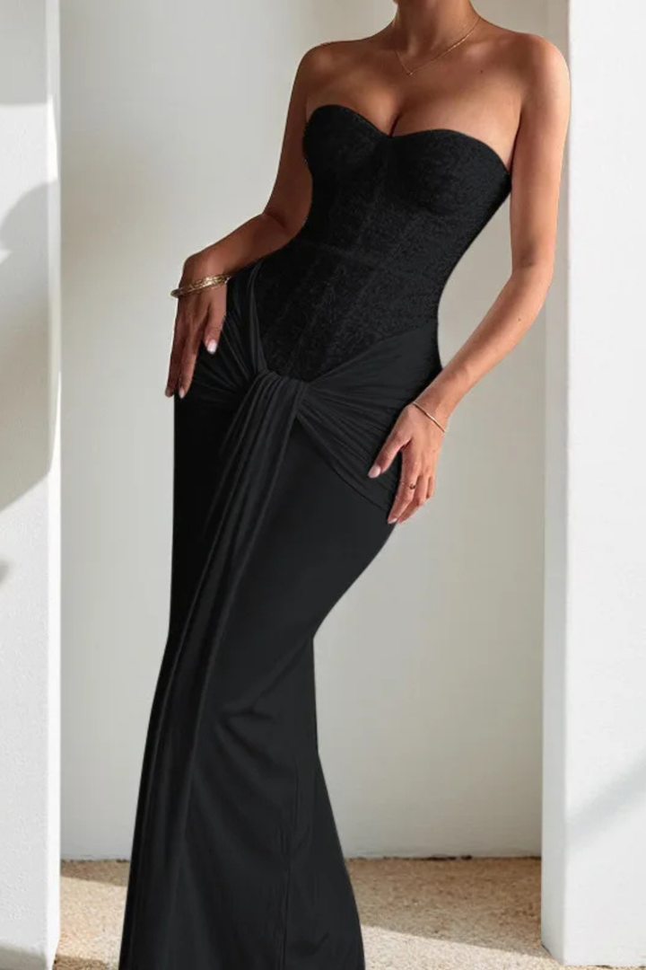 Formal strapless maxi gown for women, featuring a sweetheart neckline and elegant mermaid silhouette.