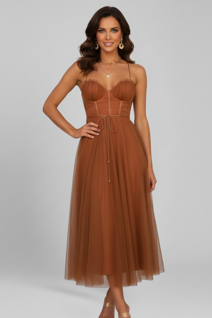 Sophisticated women's strapless party dress, a midi length evening gown with an elegant layered skirt design.