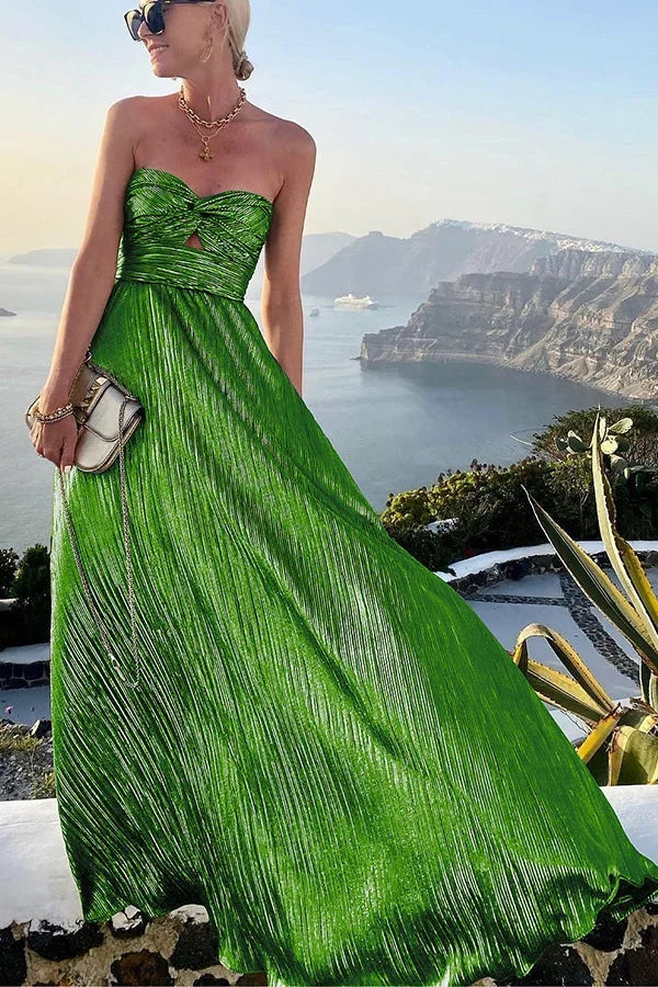 Model wearing stunning strapless pleated maxi dress, embodying women's elegant formal fashion & evening wear.