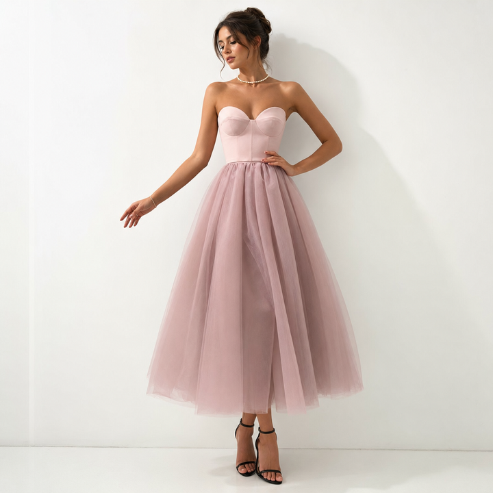 Chic women's strapless pleated maxi dress, an elegant formal evening gown for special occasions.