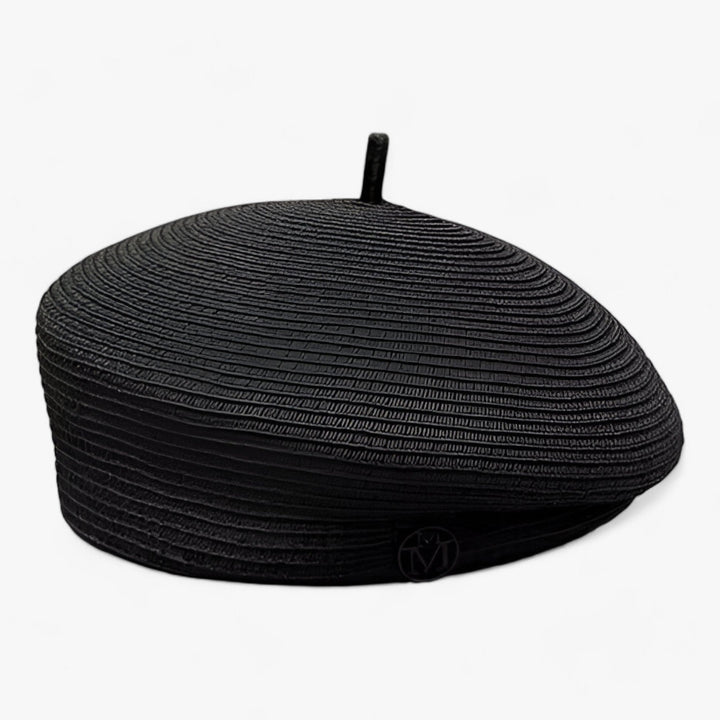 Chic women's straw fedora, an essential summer accessory for elegant sun protection at the beach or resort.