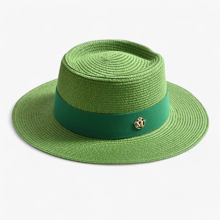Women's UV protective straw beach hat. Stylish wide brim for summer fashion & sun safety.