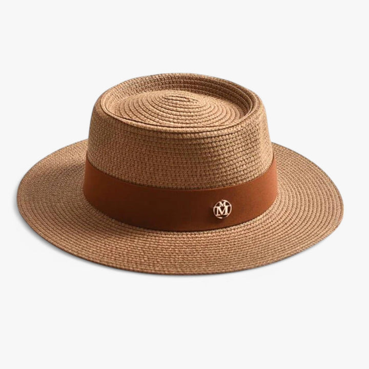 Fashionable women's straw sun hat, a must-have elegant accessory with wide brim for UV protection.