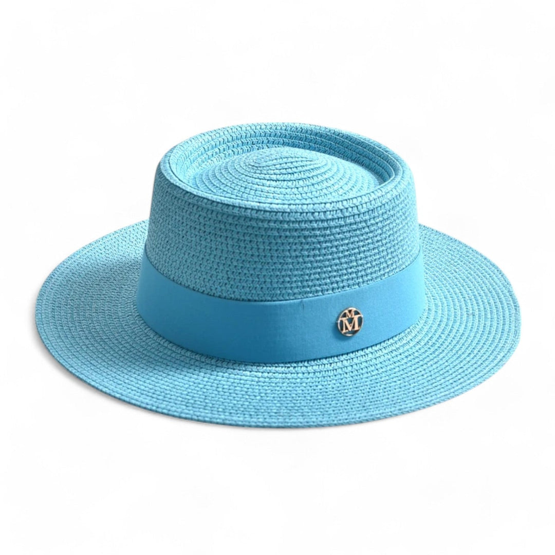 Elegant wide brim straw hat for women. Ideal for beach, travel, and superior UV sun protection.