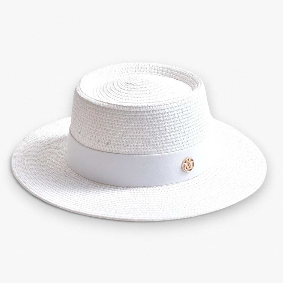 Elegant women's straw sun hat, a stylish accessory with a wide brim for excellent UV protection.