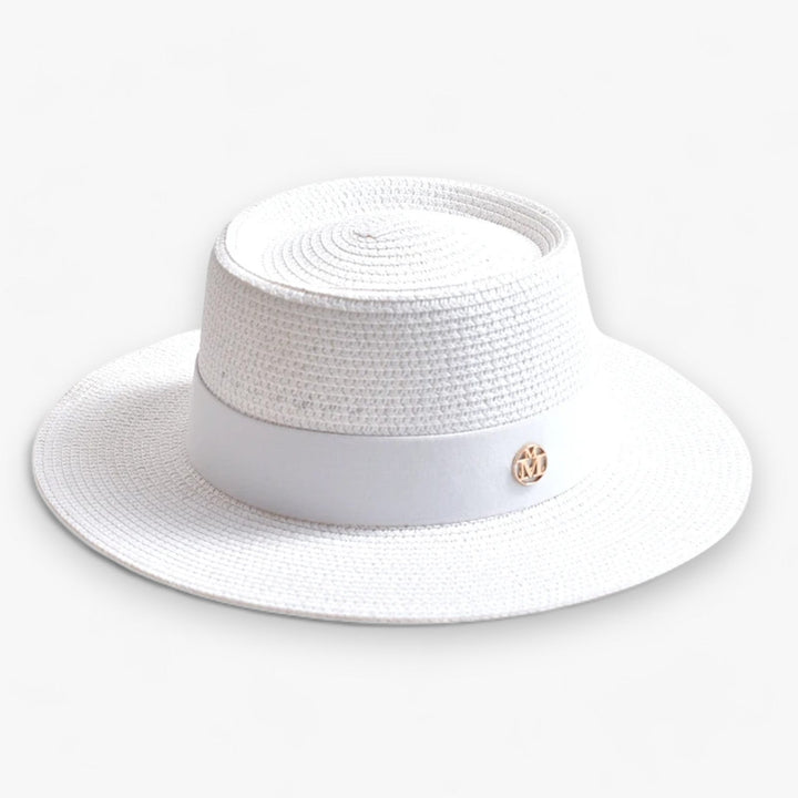 Elegant women's straw sun hat, a stylish accessory with a wide brim for excellent UV protection.