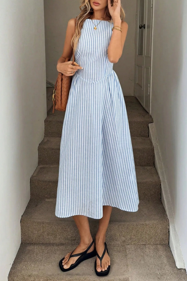 Elegant women's striped pleated halter neck midi dress, perfect for summer events and versatile fashion.