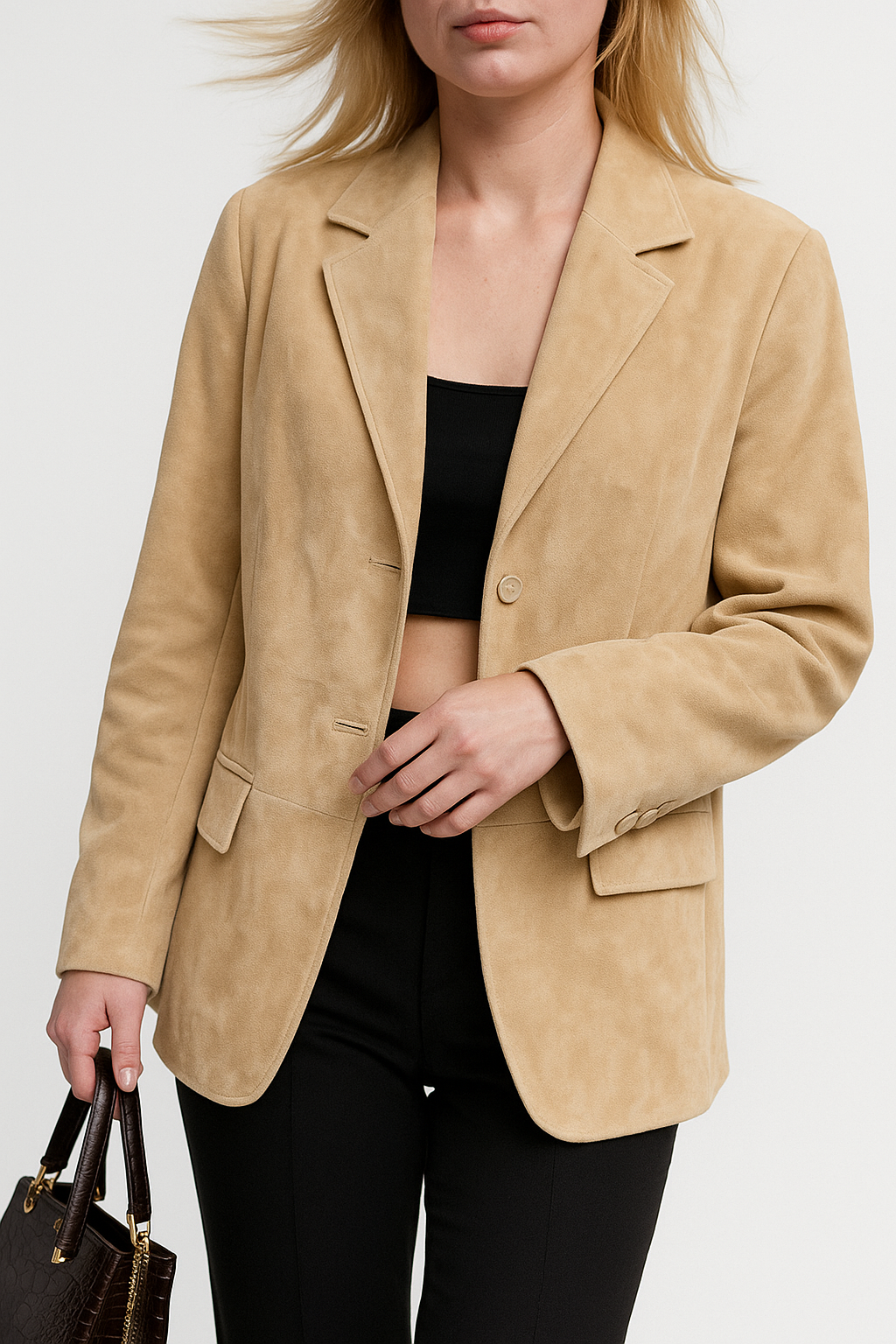 Sophisticated women's suede jacket, an elegant outerwear piece for a chic, versatile wardrobe.