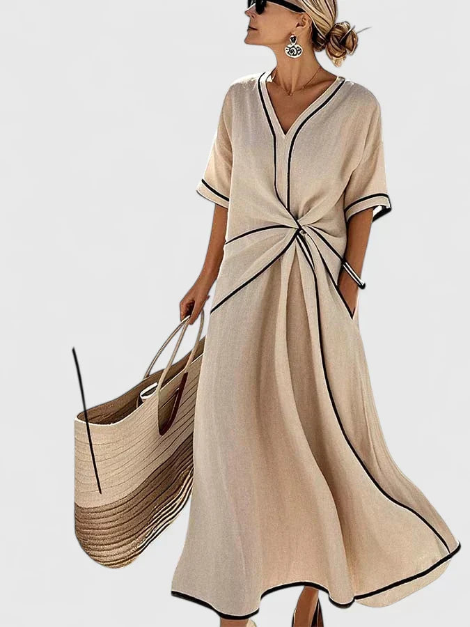 Stylish women's twist-front V-neck midi dress for summer. A-line design, ideal for casual outings, spring, or evening.