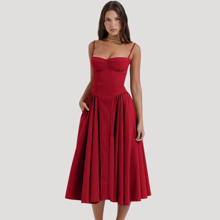 Women's formal A-line midi dress with a beautiful sweetheart corset bodice. Perfect wedding guest attire.