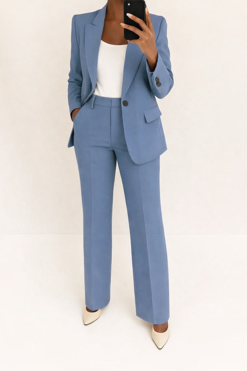 Elegant women's tailored blazer & wide leg pants suit set. Perfect for business or formal events.