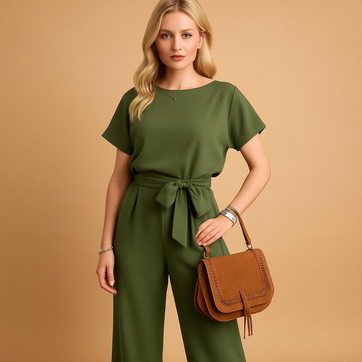 Tailored women's jumpsuit with graceful flowy sleeves, an elegant choice for any formal or special event.