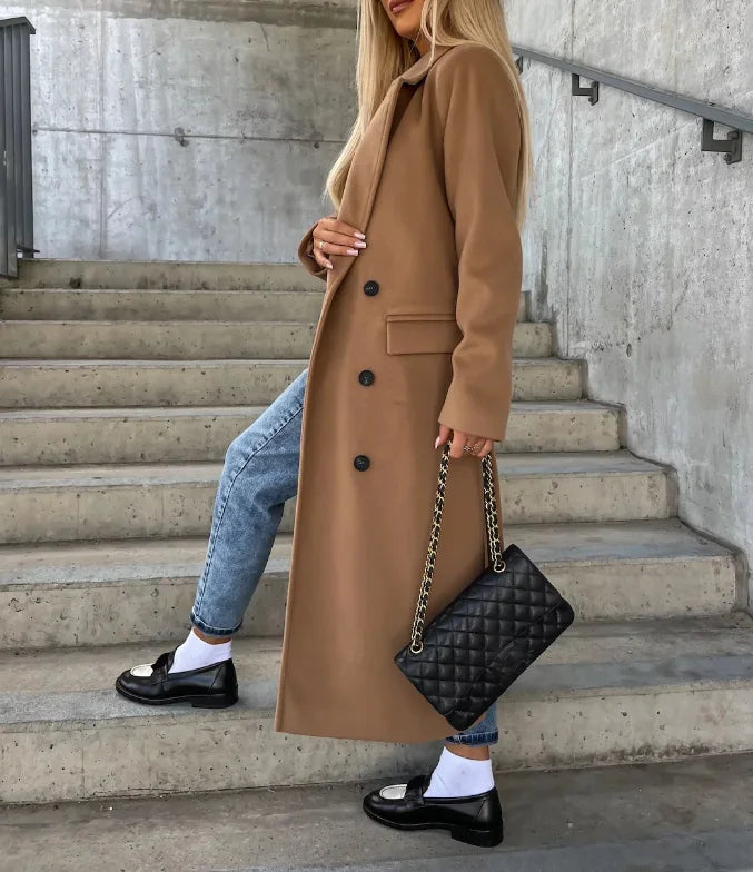 Chic women's belted trench coat, a structured long coat defining an elegant silhouette for winter style.
