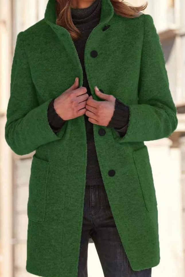 Sophisticated women's tailored mid-length winter coat featuring an elegant button closure and sleek design.
