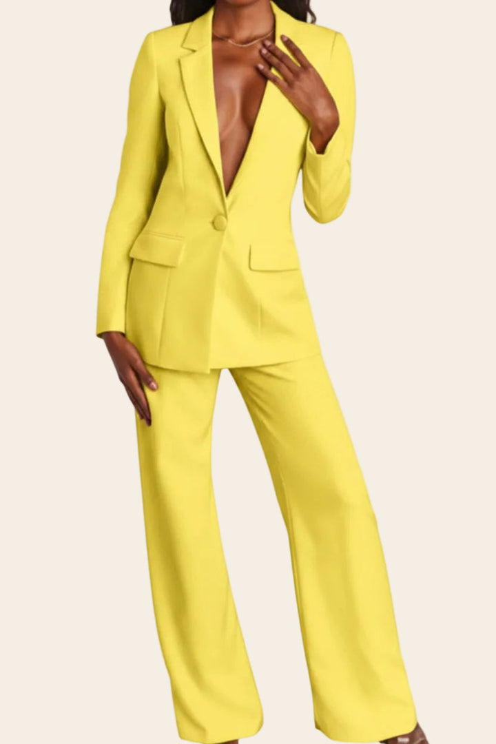 Professional women's tailored suit set. Pair this chic blazer & trousers for an elegant business outfit.