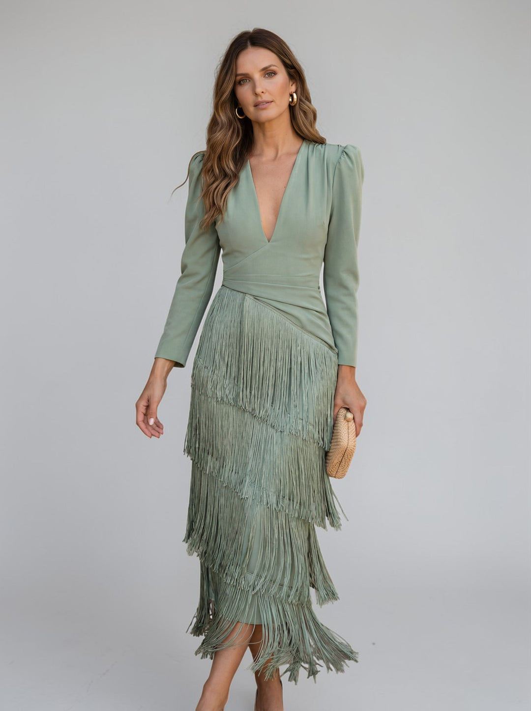Stylish women's V-neck midi dress featuring tiered fringe, a glamorous choice for formal evening wear.