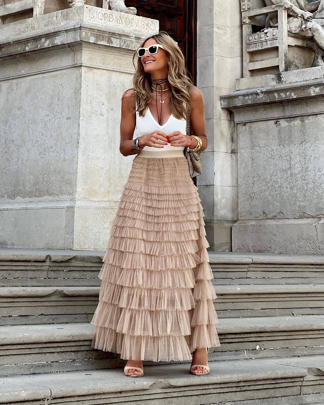 Elegant women's tiered ruffle maxi skirt, perfect for evening wear or special occasions.
