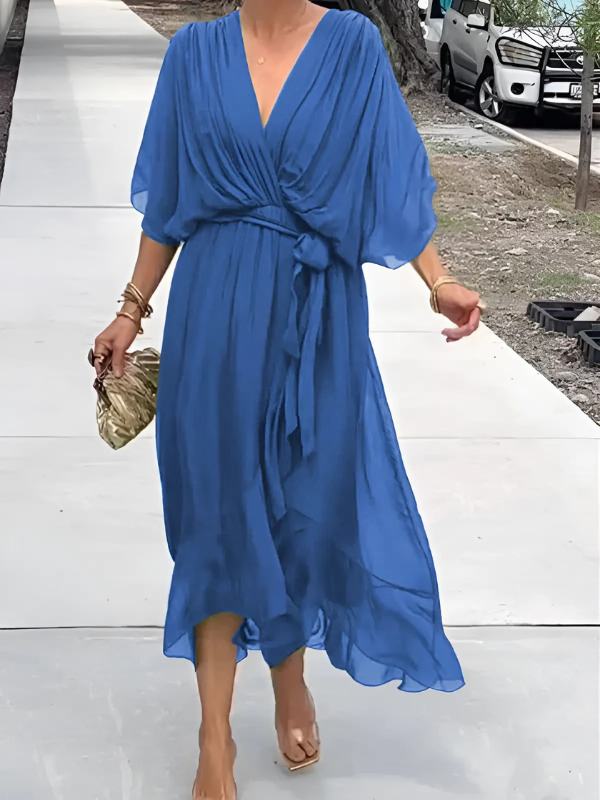Close-up of the elegant women's wrap midi dress fabric, showcasing its comfortable and flattering drape.