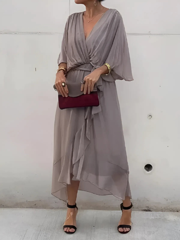 Comfortable and flattering women's timeless wrap midi dress, ideal for elegant spring fashion or versatile everyday style.