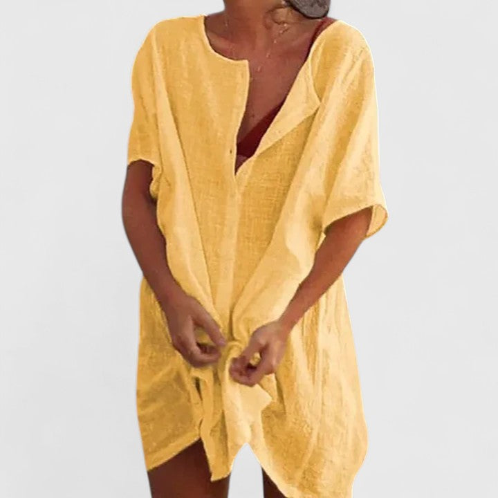 Flowy women's summer tunic dress. Elegant and comfortable, great for beach or everyday style and fashion.