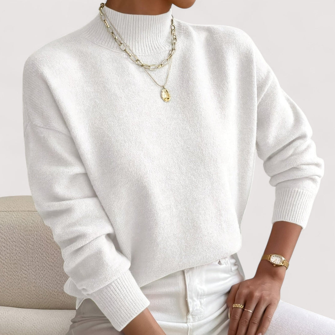 Elegant women's turtleneck sweater for ultimate comfort. Chic knit pullover, perfect for fall & winter fashion.