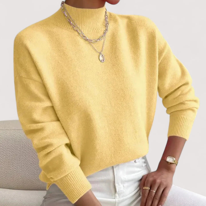 Comfortable women's knit turtleneck pullover, ideal for everyday wear. Elegant winter fashion essential.