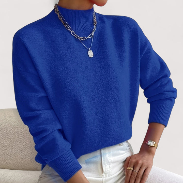 Cozy women's turtleneck pullover. Elegant knitwear designed for comfortable everyday fall & winter wear.