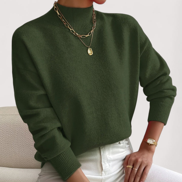 Stylish women's turtleneck sweater, offering elegant comfort. A chic long sleeve knit for fall outfits.