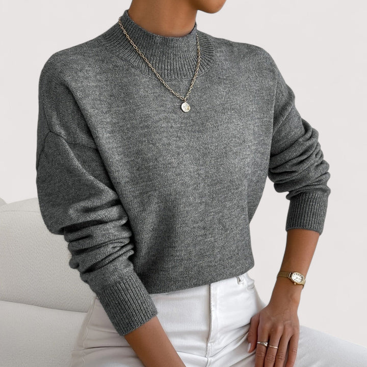 Comfortable & elegant women's turtleneck sweater. Chic knit pullover for versatile winter fashion.