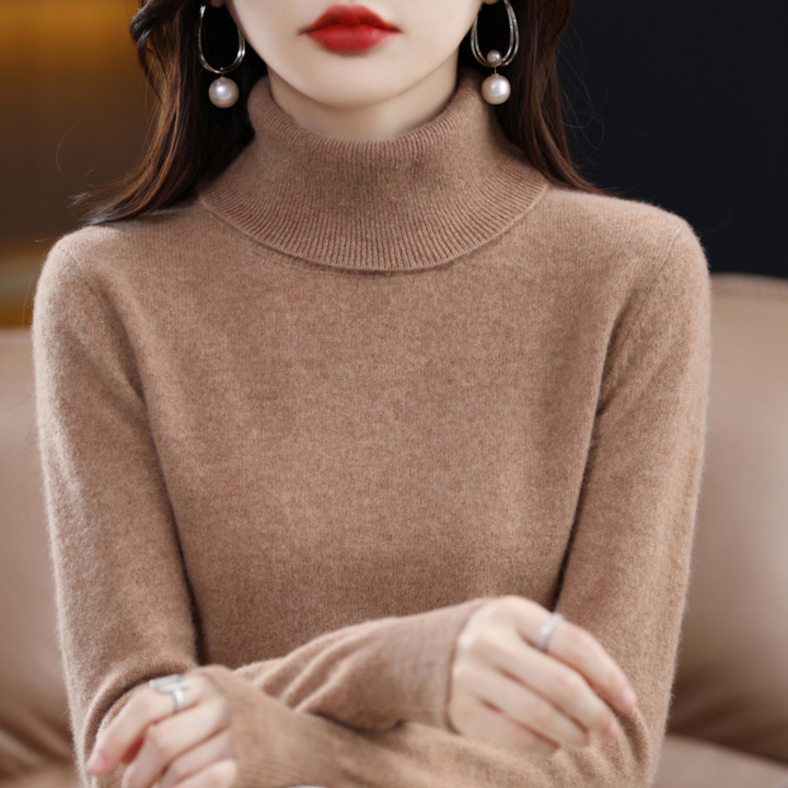 Stylish women's turtleneck sweater, slim fit, cozy high neck for elegant winter fashion.